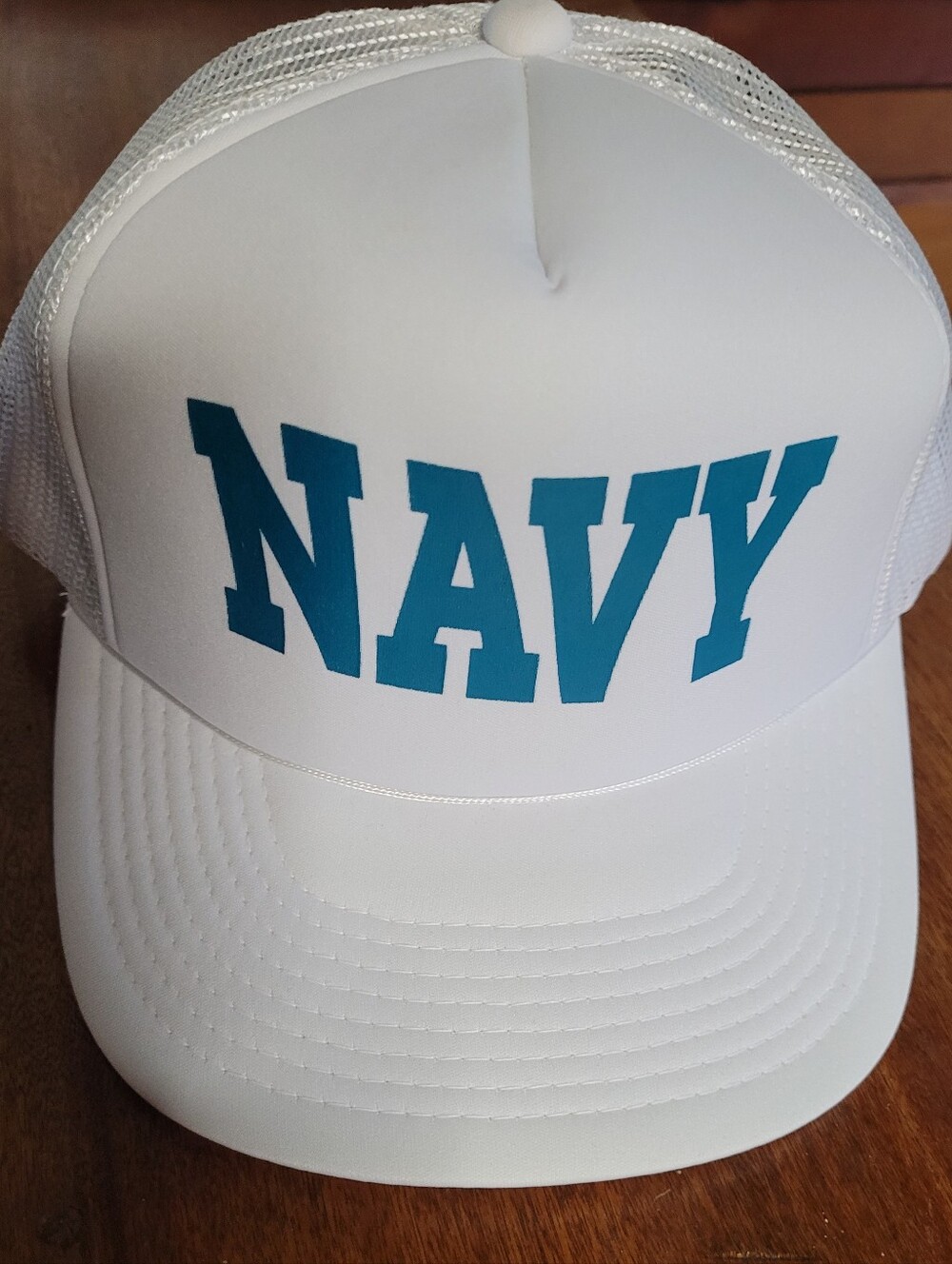 White Trucker Hat with Teal "NAVY" Print